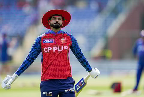 Punjab Kings' captain Shreyas Iyer during a warm-up session before an Indian Premier League (IPL) 2026 T20 cricket match between Punjab Kings and Delhi Capitals, in New Delhi.