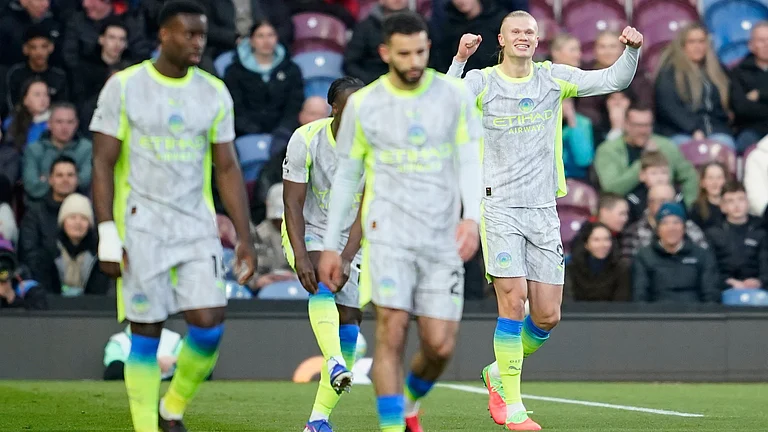 Manchester City's Erling Haaland celebrates after scoring during the Premier League soccer match between Burnley and Manchester City in Burnley, England, Wednesday, April 22, 2026. - | Photo: AP/Dave Thompson