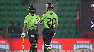 thepslt20/X : Lahore Qalandars cricketers in action against Peshawar Zalmi in PSL 2026 clash at the Gaddafi Stadium in Lahore.