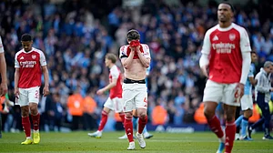 | Photo: AP/Dave Thompson : Arsenal's Declan Rice reacts at the end of the English Premier League match between Manchester City and and Arsenal, in Manchester, England, Sunday, April 19, 2026.