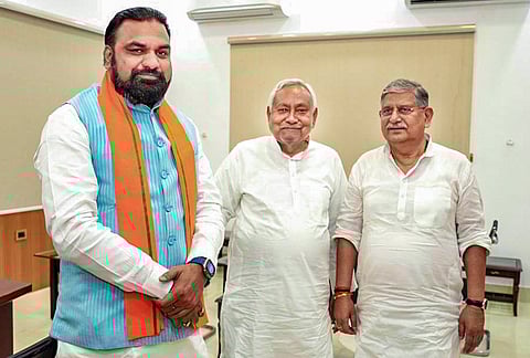 Bihar Chief Minister Samrat Choudhary, left, meets former CM Nitish Kumar after securing a vote of confidence in the Assembly, in Patna, Bihar. 