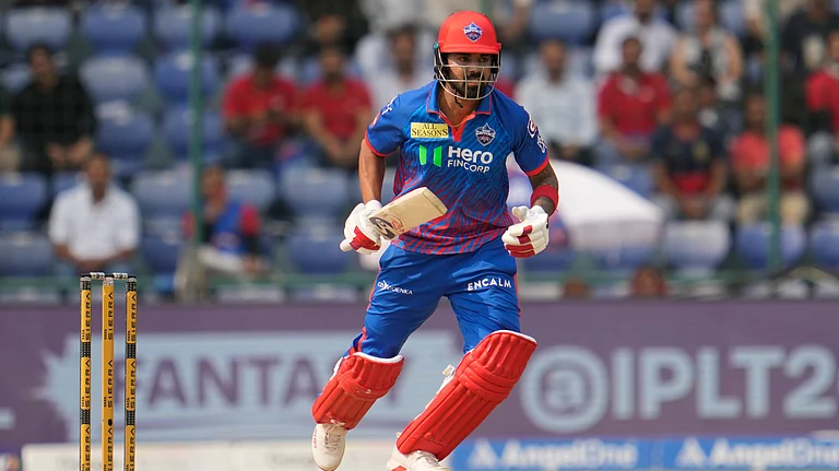 Delhi Capitals' KL Rahul run between the wickets to score during the Indian Premier League cricket match between Delhi Capitals and Punjab Kings in Delhi, India, Saturday, April 25, 2026. - (AP Photo/Manish Swarup)
