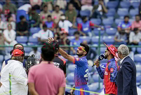 Punjab Kings' captain Shreyas Iyer and Delhi Capitals' captain Axar Patel during the toss before an Indian Premier League (IPL) 2026 T20 cricket match between Punjab Kings and Delhi Capitals, in New Delhi.