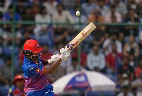 Delhi Capitals' KL Rahul hits a six during the Indian Premier League cricket match between Delhi Capitals and Punjab Kings in New Delhi.