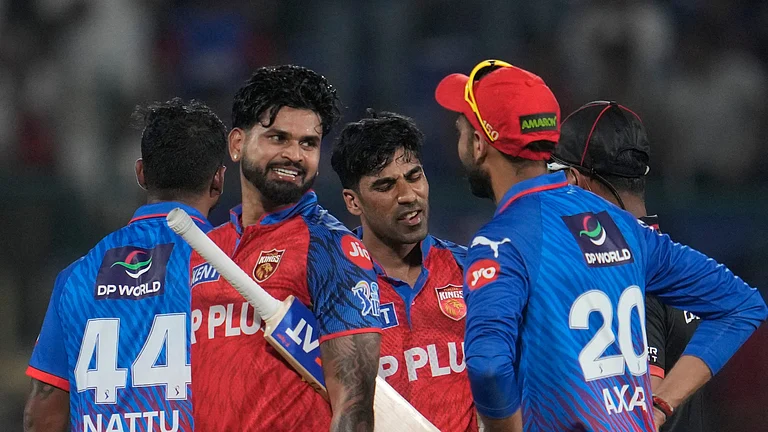 Delhi Capitals' captain Axar Patel, right, gesture with Punjab Kings' captain Shreyas Iyer after Punjab Kings win the Indian Premier League cricket match between Delhi Capitals and Punjab Kings in New Delhi, India, Saturday, April 25, 2026. - (AP Photo/Manish Swarup)