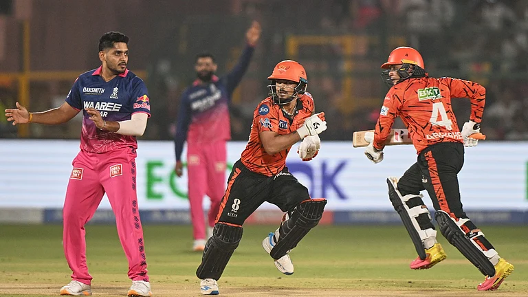 Sunrisers Hyderabad's Ishan Kishan, center, runs between the wickets without his bat with Abhishek Sharma during the Indian Premier League cricket match between Rajasthan Royals and Sunrisers Hyderabad in Jaipur, India, Saturday, April 25, 2026. - (AP Photo)