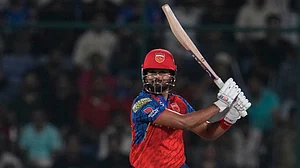 AP/Manish Swarup : Shreyas Iyer hits a boundary during the Indian Premier League match between Delhi Capitals and Punjab Kings in New Delhi.