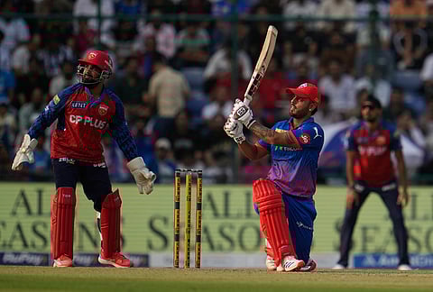 Delhi Capitals' Nitish Rana plays a shot during the Indian Premier League cricket match between Delhi Capitals and Punjab Kings in New Delhi.