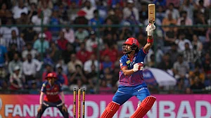 (AP Photo/Manish Swarup) : Delhi Capitals' KL Rahul plays a shot during the Indian Premier League cricket match between Delhi Capitals and Punjab Kings in New Delhi, India, Saturday, April 25, 2026.
