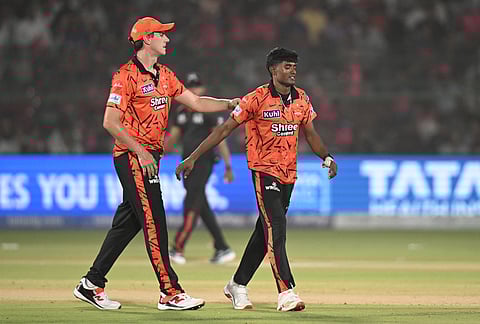 Sunrisers Hyderabad's Pat Cummins cheers bowler Sakib Hussain during the Indian Premier League cricket match between Rajasthan Royals and Sunrisers Hyderabad in Jaipur.