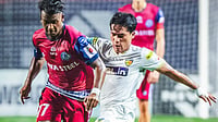 IndSuperLeague/X : Jamshedpur FC footballers in action against Chennaiyin FC players in ISL 2025-26. 