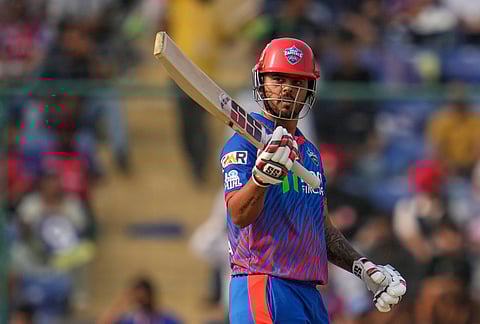 Delhi Capitals' Nitish Rana celebrates his fifty runs during the Indian Premier League cricket match between Delhi Capitals and Punjab Kings in New Delhi.