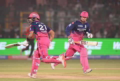 Rajasthan Royals' Vaibhav Sooryavanshi, right, and Dhruv Jurel run between the wickets to score during the Indian Premier League cricket match between Rajasthan Royals and Sunrisers Hyderabad in Jaipur.