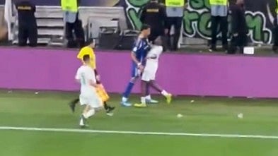 Screengrab from a video of Al-Ahli's Zakaria Hawsawi head-butting Machida Zelvia's Tete Yengi during the AFC Champions League Elite 2025-26 final. - null