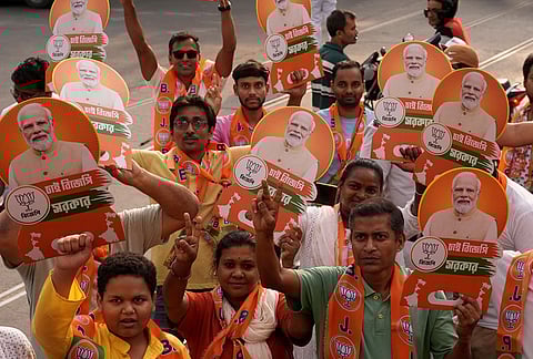 A glimpse of Prime Minister Narendra Modi's roadshow in central Kolkata for the election campaign for the upcoming assembly election in West Bengal. 
