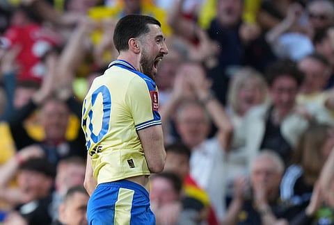 Southampton's Finn Azaz celebrates after scoring during the FA Cup semifinal soccer match between Manchester City and Southampton in Manchester, England.
