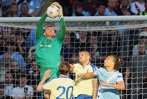Southampton's goalkeeper Daniel Peretz catches the ballduring the FA Cup semifinal soccer match between Manchester City and Southampton in Manchester, England.