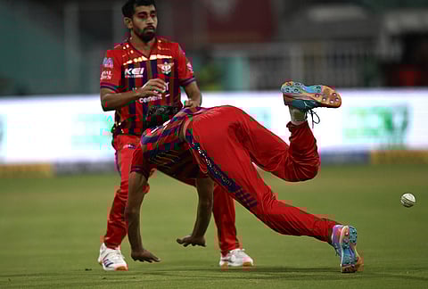 Lucknow Super Giants' Digvesh Rathi drops a catch during the Indian Premier League cricket match between Kolkata Knight Riders and Lucknow Super Giants in Lucknow.
