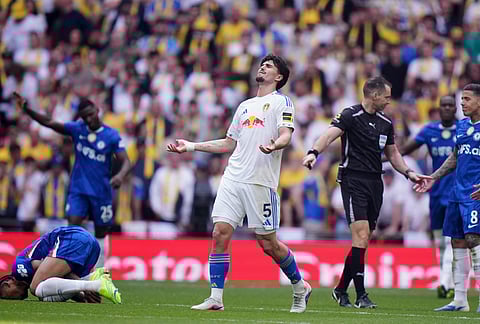 Leeds' Pascal Struijk reacts to a referee decision during the FA Cup semifinal soccer match between Chelsea and Leeds in London, England.