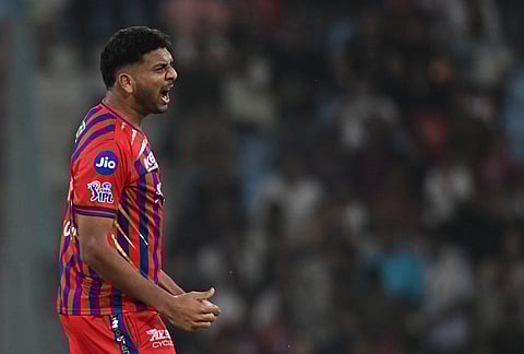 Lucknow Super Giants' Mohsin Khan celebrates the wicket of Kolkata Knight Riders' Anukul Roy during the Indian Premier League cricket match between Kolkata Knight Riders and Lucknow Super Giants in Lucknow.