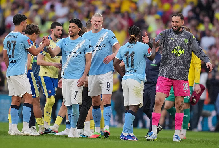 Manchester City players celebrate after the FA Cup semifinal soccer match between Manchester City and Southampton in Manchester, England. - | Photo: AP/Kin Cheung