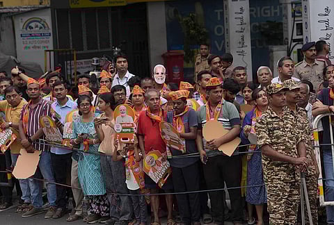 A glimpse of Prime Minister Narendra Modi's roadshow in central Kolkata for the election campaign for the upcoming assembly election in West Bengal. 

