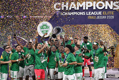 Al-Ahli players celebrate with the trophy after defeating Machida Zelvia in the AFC Champions League Elite soccer match at King Abdullah Sports City Stadium, in Jeddah, Saudi Arabia.
