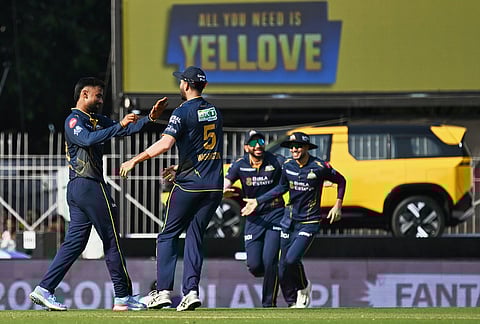 Gujarat Titans' Manav Suthar, left, celebrates with teammates the wicket of Chennai Super Kings' Dewald Brevis during the Indian Premier League cricket match between Chennai Super Kings and Gujarat Titans in Chennai.