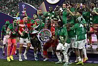 Al-Ahli 1-0 Machida Zelvia, AFC Champions League Elite 2025-26 Final: Feras Albrikan Extra-Time Goal Helps Retain Crown | Photo: AP/Ali Issa : Al-Ahli players celebrate the trophy of AFC Champions League Elite after winning the match against Machida Zelvia, at King Abdullah Sports City Stadium, in Jeddah, Saudi Arabia.