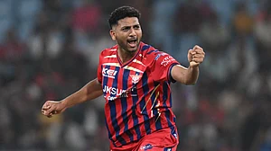 AP Photo : Lucknow Super Giants' Mohsin Khan celebrates the wicket of Kolkata Knight Riders' Rovman Powell during the Indian Premier League cricket match between Kolkata Knight Riders and Lucknow Super Giants in Lucknow.