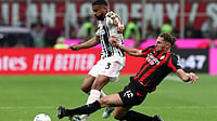 SerieA_EN/X : AC Milan and Juventus players in action in Serie A 2025-26 clash at the San Siro. 
