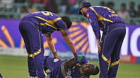 IPL Dispatch: Obstructing Field Dismissal Sparks Controversy; Rathour Shares Update On Sooryavanshi's Injury AP : Rovman Powell lay on the ground in pain after getting injured while taking a catch to dismiss Mitchell Marsh during the Indian Premier League match between Kolkata Knight Riders and Lucknow Super Giants in Lucknow.