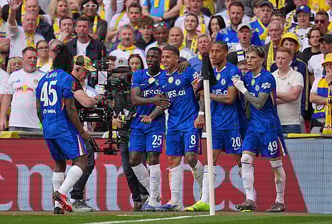 Chelsea players celebrate after scoring during the FA Cup semifinal soccer match between Chelsea and Leeds in London, England.