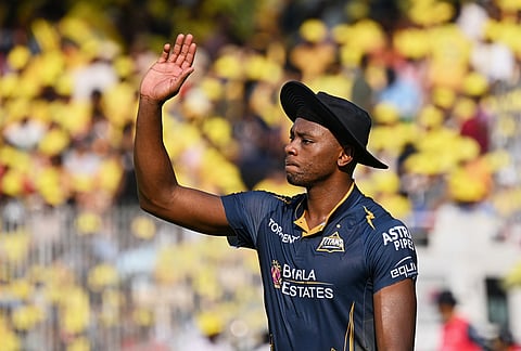 Gujarat Titans' Kagiso Rabada gestures in the field during the Indian Premier League cricket match between Chennai Super Kings and Gujarat Titans in Chennai.