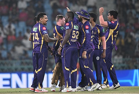 Kolkata Knight Riders' Sunil Narine, left, celebrates with teammates the wicket of Lucknow Super Giants' captain Rishabh Pant during the Indian Premier League cricket match between Kolkata Knight Riders and Lucknow Super Giants in Lucknow.