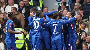 Photo: AP : Chelsea players celebrate after Jorrel Hato scored his side's opening goal during the English FA Cup quarter-final against Port Vale in London.