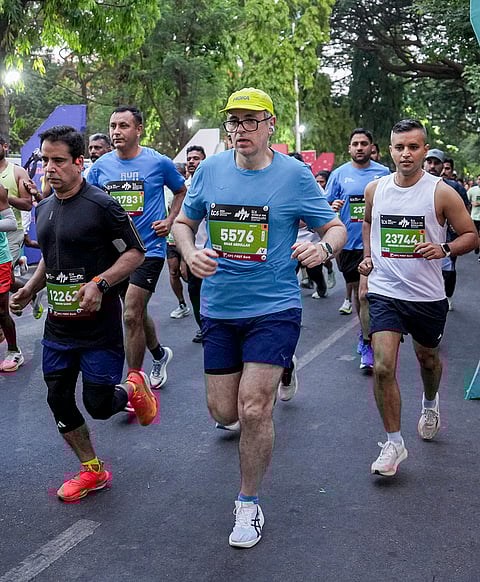 Jammu and Kashmir Chief Minister Omar Abdullah takes part in the TCS World 10K Marathon, in Bengaluru.
