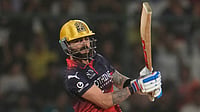 Photo: AP/Manish Swarup : Virat Kohli plays a shot during the Indian Premier League match between Delhi Capitals and Royal Challengers Bengaluru in Delhi.