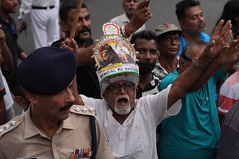 Supporters during a roadshow led by West Bengal Chief Minister and Trinamool Congress supremo Mamata Banerjee amid the ongoing West Bengal Assembly elections, in Kolkata.