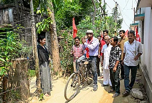 | Photo: PTI : CPI(M) candidate from Santipur constituency, Soumen Mahato, campaigns for the West Bengal Assembly elections, in Nadia.