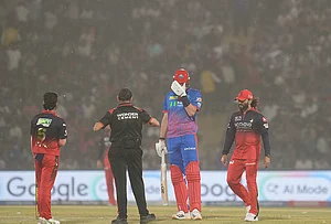 | Photo: PTI/Ravi Choudhary : Royal Challengers Bengaluru's Rajat Patidar and Delhi Capitals' Kyle Jamieson react amid a dust storm during the Indian Premier League (IPL) T20 cricket match between Delhi Capitals and Royal Challengers Bengaluru, in New Delhi.