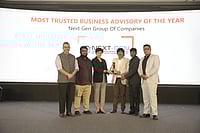 Next-Gen Group of Companies leadership receiving the Outlook Business - Most Trusted Business Advisory of the Year 2026