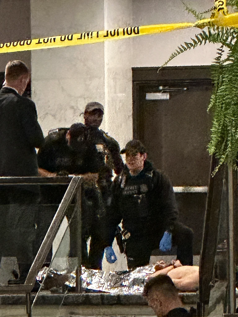 Members of law enforcement control shooting suspect Cole Tomas Allen during the White House Correspondents Dinner, Saturday, April 25, 2026, in Washington. - (AP Photo/Alex Brandon)