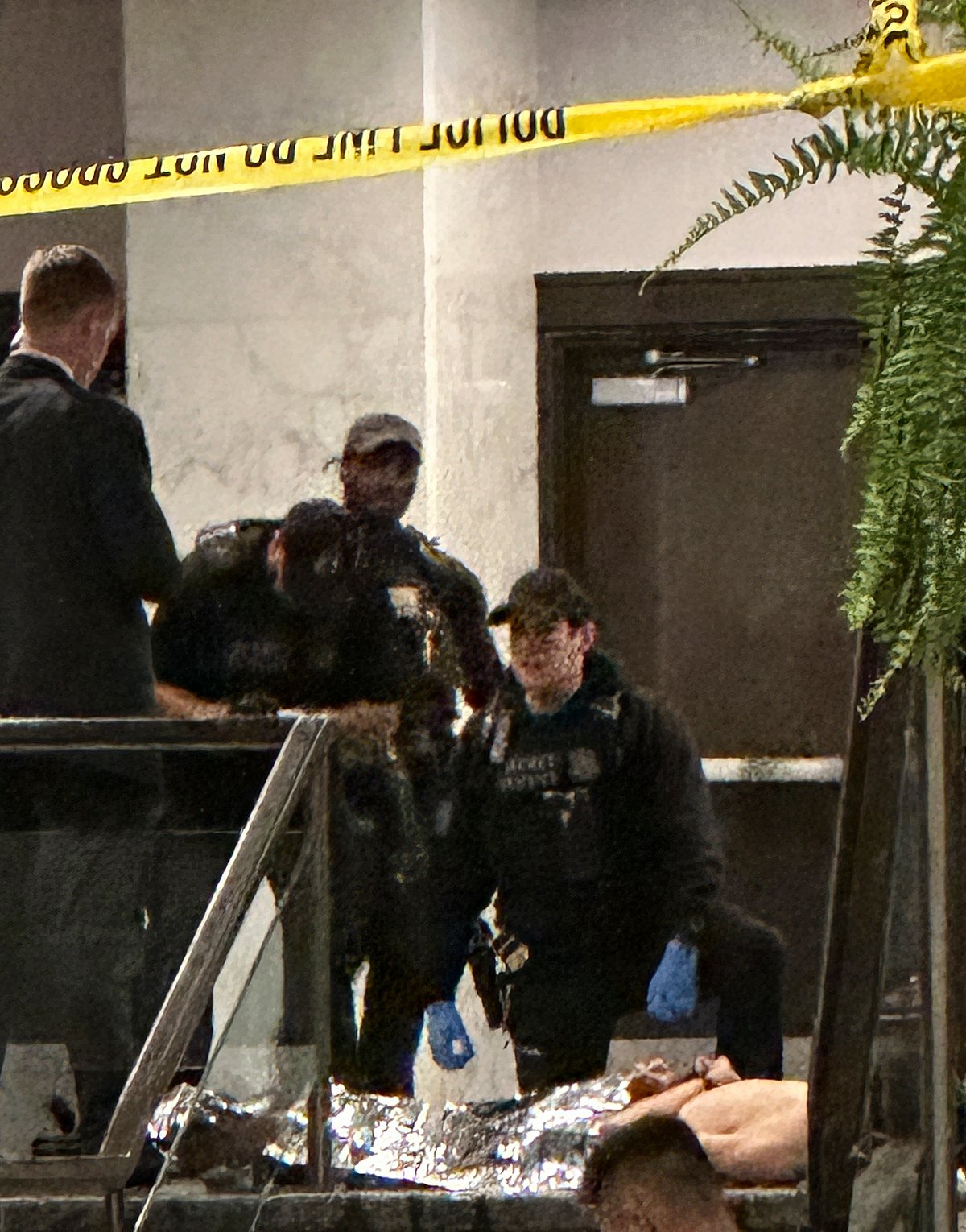 (AP Photo/Alex Brandon) : Members of law enforcement control shooting suspect Cole Tomas Allen during the White House Correspondents Dinner, Saturday, April 25, 2026, in Washington. 