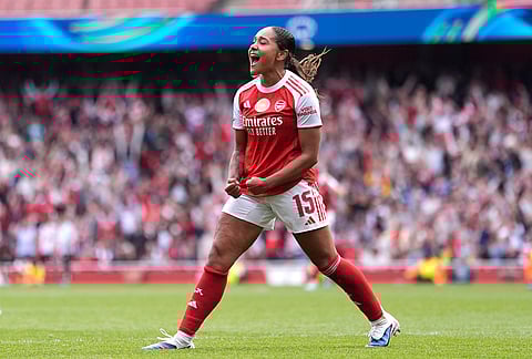 Arsenal's Olivia Smith celebrates scoring her side's second goal  during the Women's Champions League semi-final, first leg soccer match between Arsenal and OL Lyonnes in London, England.