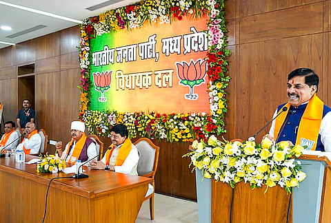Madhya Pradesh Chief Minister Mohan Yadav addresses the BJP legislative party meeting, in Bhopal. 