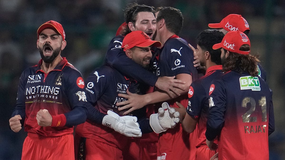 Josh Hazlewood, centre, celebrates with teammates the wicket of KL Rahul during the Indian Premier League match between Delhi Capitals and Royal Challengers Bengaluru in Delhi. - Photo: AP