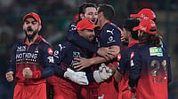 Photo: AP : Josh Hazlewood, centre, celebrates with teammates the wicket of KL Rahul during the Indian Premier League match between Delhi Capitals and Royal Challengers Bengaluru in Delhi.