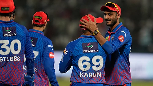 | Photo: AP/Manish Swarup : Delhi Capitals' Karun Nair, second from right, celebrates with captain Axar Patel after takes the catch to dismiss Punjab Kings' Nehal Wadhera during the Indian Premier League cricket match between Delhi Capitals and Punjab Kings in New Delhi, India, Saturday, April 25, 2026.