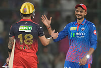 DC Vs RCB, IPL 2026: Hazlewood, Bhuvneshwar Set Up Bengaluru's Ruthless Nine-Wicket Win In Delhi | Photo: AP/Manish Swarup : Delhi Capitals' captain Axar Patel, right, shake hands with Royal Challengers Bengaluru's Virat Kohli after Royal Challengers Bengaluru won the match during the Indian Premier League cricket match between Delhi Capitals and Royal Challengers Bengaluru in Delhi.